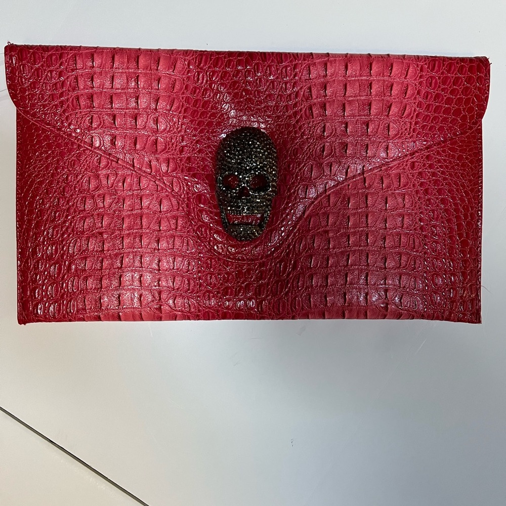 Ladies croc like clutch. Leatherette New with tags